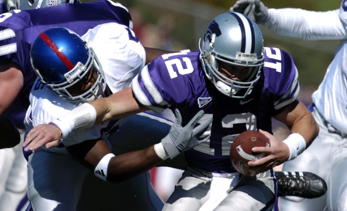 Oct 8, 2005; Manhattan, KS, USA; Kansas State Wildcats quarterback Allan Evridge is tackled by Kansas Jayhawks linebacker #59 Brandon Perkins in the first half at KSU Stadium in Manhattan, KS. Mandatory Credit: Photo by John Rieger-USA TODAY Sports Copyright (c) 2005 John Rieger